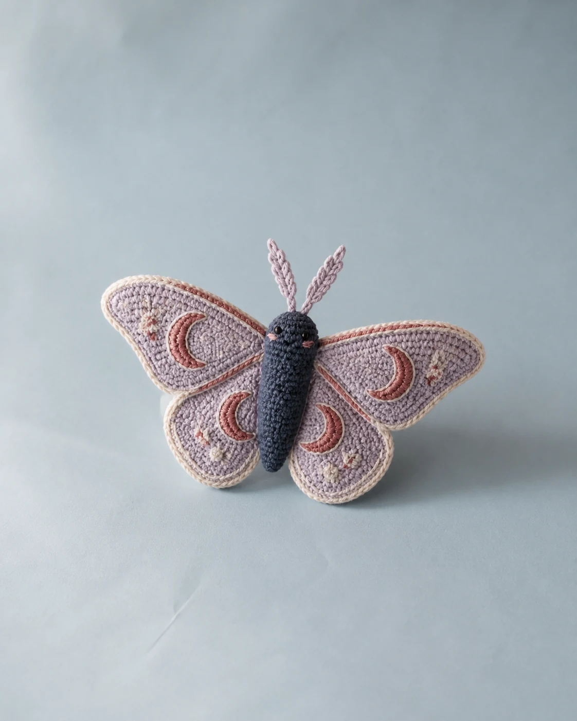 Lavender and midnight-blue crochet moon moth